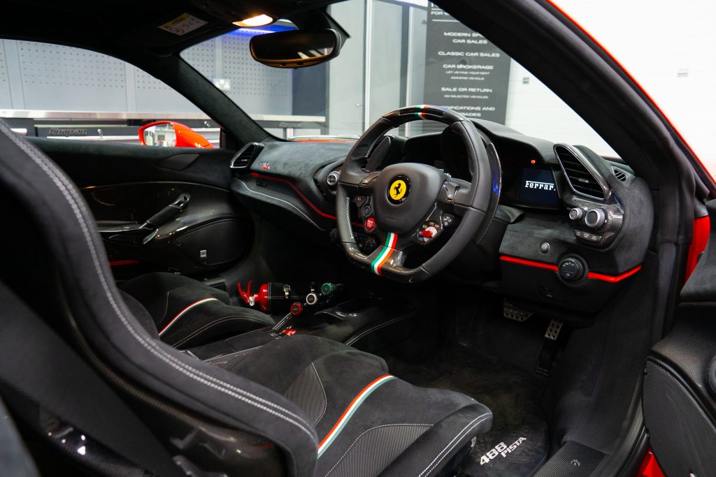ferrari super car interior in mad automotives showroom