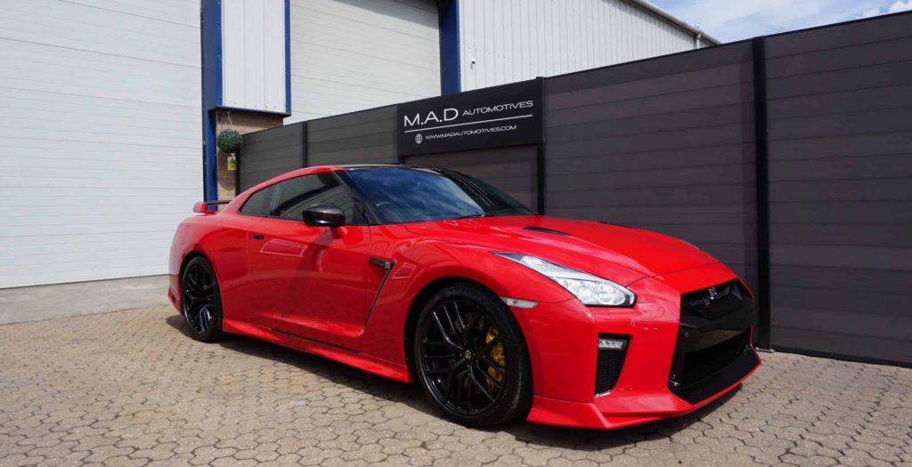 Red Nissan gtr r35 performance car outside Mad automotive